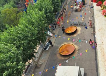Los vecinos de Castellanos reponen fuerzas con la paella popular para continuar las fiestas